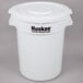 A white plastic Continental Huskee trash can with a white lid.