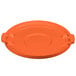 An orange plastic lid with a handle for a Carlisle Bronco trash can.