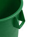 A green Carlisle Bronco 55 gallon plastic trash can with a handle.