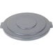 A grey plastic lid for a Carlisle 55 gallon trash can.