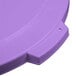 A purple plastic Carlisle Bronco trash can lid with a handle and holes.