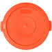 An orange plastic Carlisle Bronco lid with a handle.