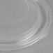 A clear plastic Sabert dome lid on a clear plastic container.