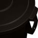 A black Carlisle Bronco trash can lid on a white background.