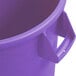 A close-up of a purple Carlisle Bronco trash can with a handle.