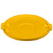 A yellow Carlisle flat round trash can lid.