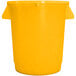 A yellow Carlisle round plastic trash can with a lid.