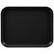 A black rectangular Cambro tray with a white border.