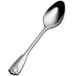 A Bon Chef stainless steel demitasse spoon with a shell design on the handle.