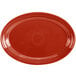 A red oval platter with a white background.