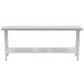 An Advance Tabco stainless steel work table with a galvanized undershelf.