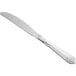 An Acopa Monaca stainless steel table knife with a white handle on a white background.