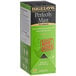 A green and black Bigelow Perfectly Mint Tea box on a counter.