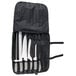 A Dexter-Russell Sani-Safe 7-piece cutlery set in a black case.