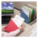 A person holding a blue Smead file folder with papers inside.