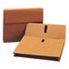 A brown Smead expansion wallet with black hook and loop closure tape.