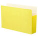 A yellow Smead file pocket with white edges.