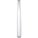 A Chef & Sommelier stainless steel teaspoon in a white tall cylindrical container.