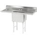 An Advance Tabco stainless steel one compartment pot sink with two drainboards.