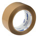 A roll of Duck Tape HP260T tan carton packaging tape with blue writing on a white background.