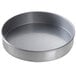 A Chicago Metallic round aluminized steel cake pan with a glazed finish.