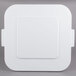 A white square Rubbermaid lid for a trash can.