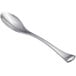 A close-up of a Chef & Sommelier stainless steel demitasse spoon with a silver handle.