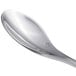 A close-up of a Chef & Sommelier stainless steel demitasse spoon with a silver handle.