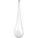 A Chef & Sommelier stainless steel dessert spoon with a white handle.