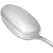 A Chef & Sommelier stainless steel dessert spoon with a silver handle.