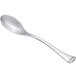 A silver spoon with a white handle.