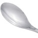 A Chef & Sommelier stainless steel dessert spoon with a silver handle.