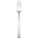 An Arcoroc stainless steel dessert fork with a silver handle.