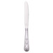 A Libbey stainless steel dinner knife with a fluted design on the handle.