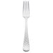 A Libbey stainless steel dinner fork with a textured silver handle.