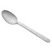 A Libbey stainless steel dessert spoon with a silver handle.