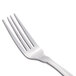 A close-up of a Libbey stainless steel utility/dessert fork with a silver handle.
