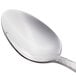 A Libbey stainless steel teaspoon with a silver handle.