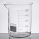 An American Metalcraft beaker glass with measurements on it.