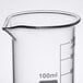 An American Metalcraft beaker glass with a measuring cup on top.