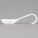 a white plastic spoon with a handle