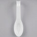 A white Fineline plastic spoon.
