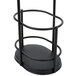 A black metal Tablecraft Gemelli olive oil cruet rack with a round base.