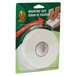 A package of Duck Tape white foam mounting tape with a roll of white tape inside.