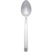 An Arcoroc stainless steel dessert spoon with a long handle on a white background.