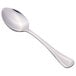 A Libbey stainless steel dessert spoon with a silver handle.