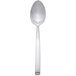 An Arcoroc stainless steel dinner spoon with a white handle.