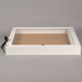 A white rectangular box with a cork bulletin board inside with a white background.