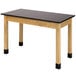 A National Public Seating science lab table with a black phenolic top and black legs.