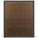 A brown rectangular bulletin board with a bronze frame and black border.
